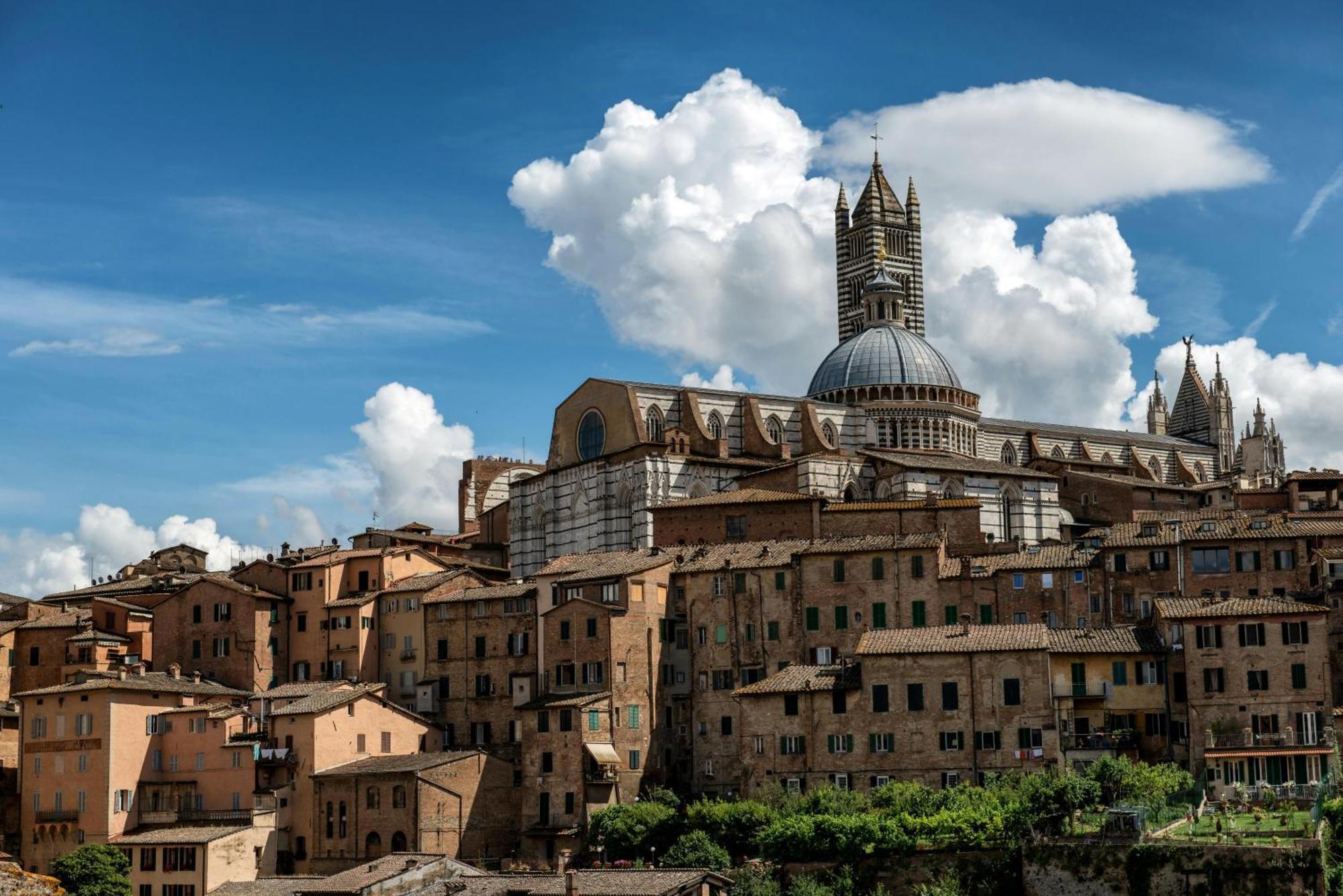Ferienwohnung Asso Di Picche Siena Exterior foto