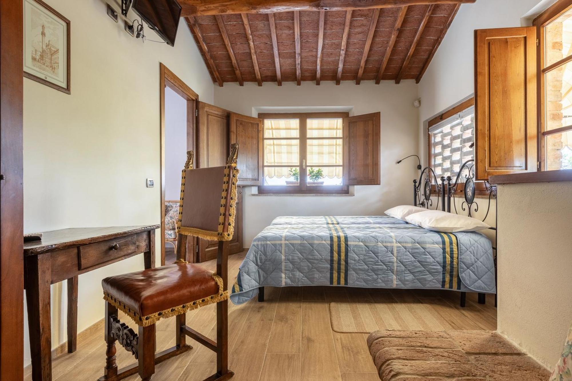 Ferienwohnung Asso Di Picche Siena Exterior foto